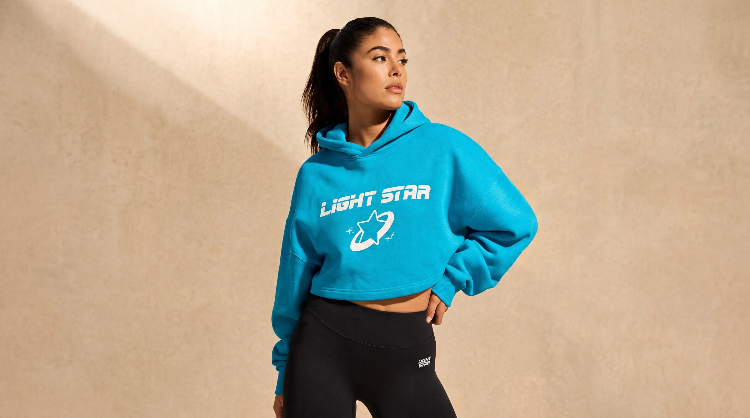 Aurora Cropped Hoodie lifestyle - Cyan